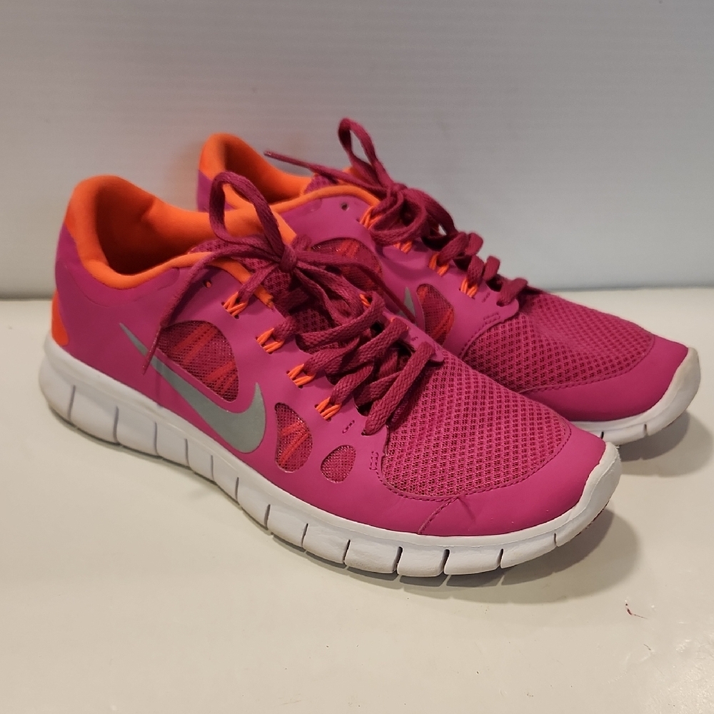Nike Free 5.0 Women's Pink and Orange Athletic Shoes 7 youth/8.5 Women
